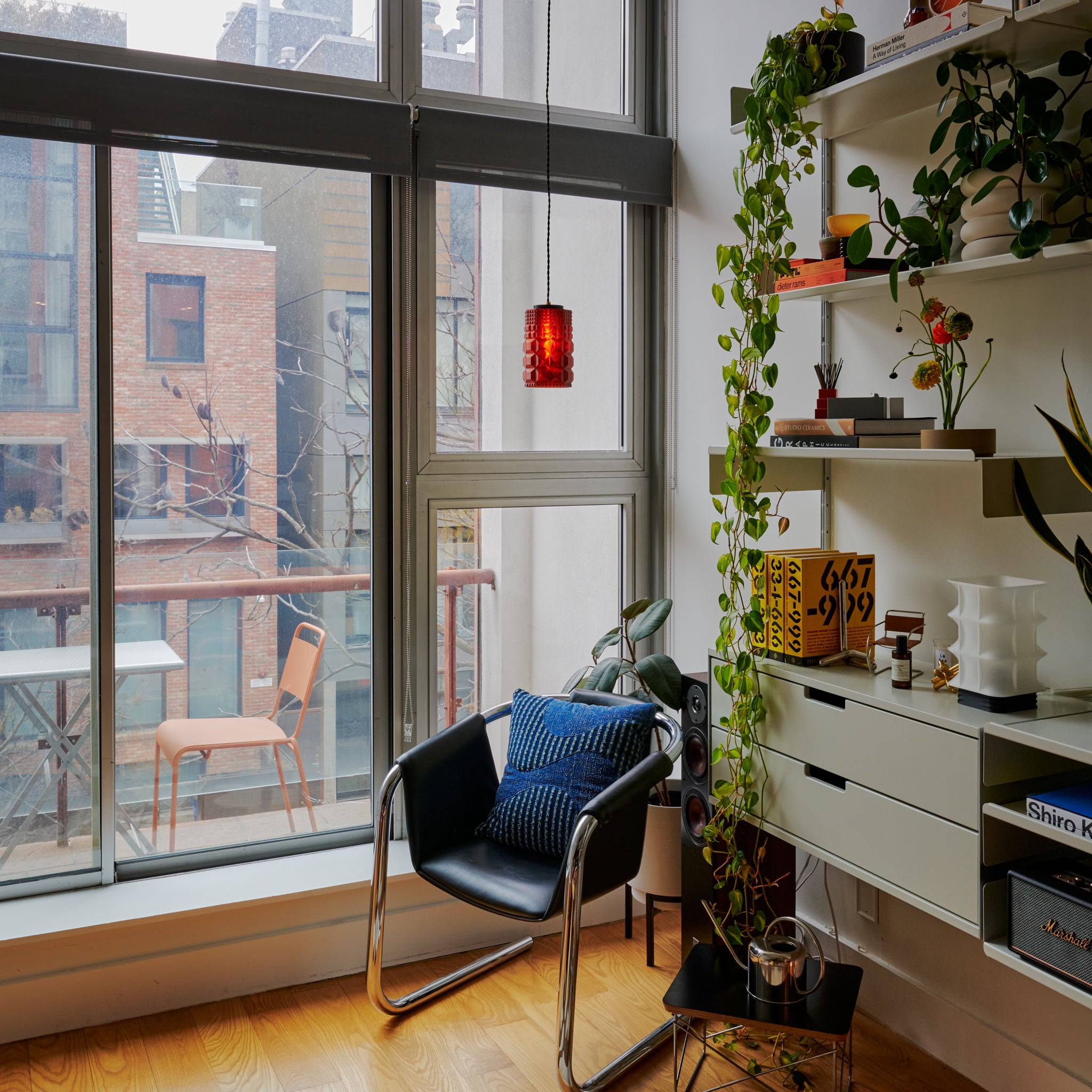 Image of Gem Pendant Amber in front of large window