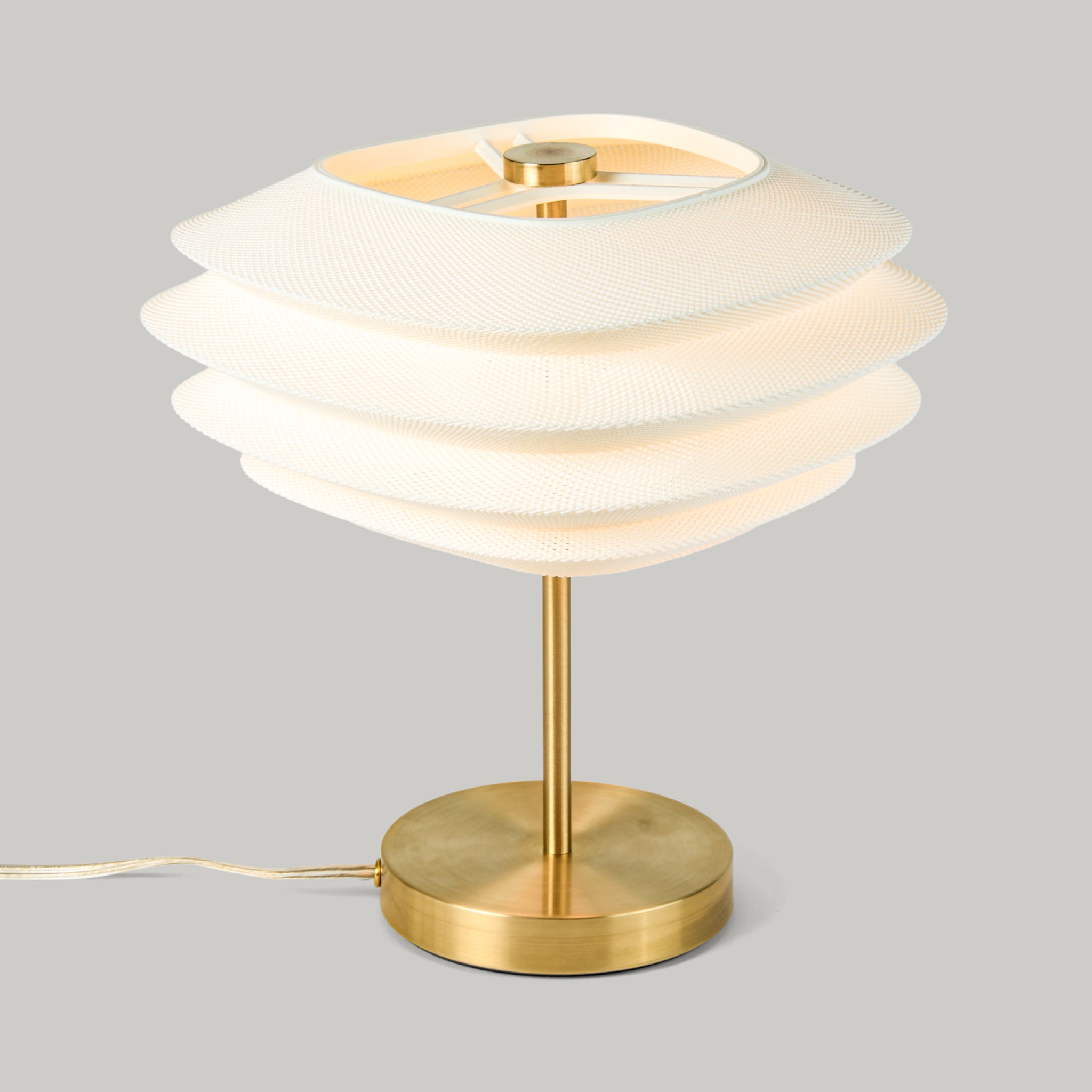 Arcas Lamp in Brass on white background