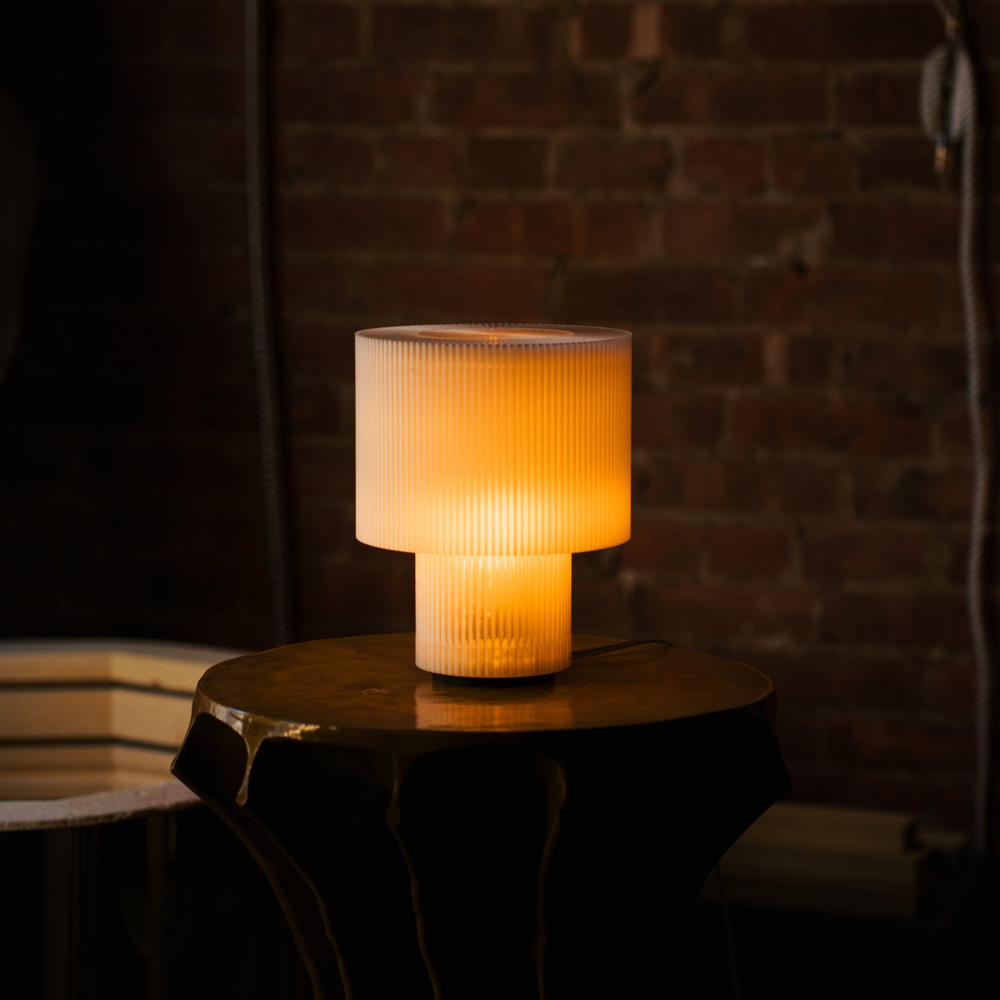 Image of Drum Lamp displaying warm glow