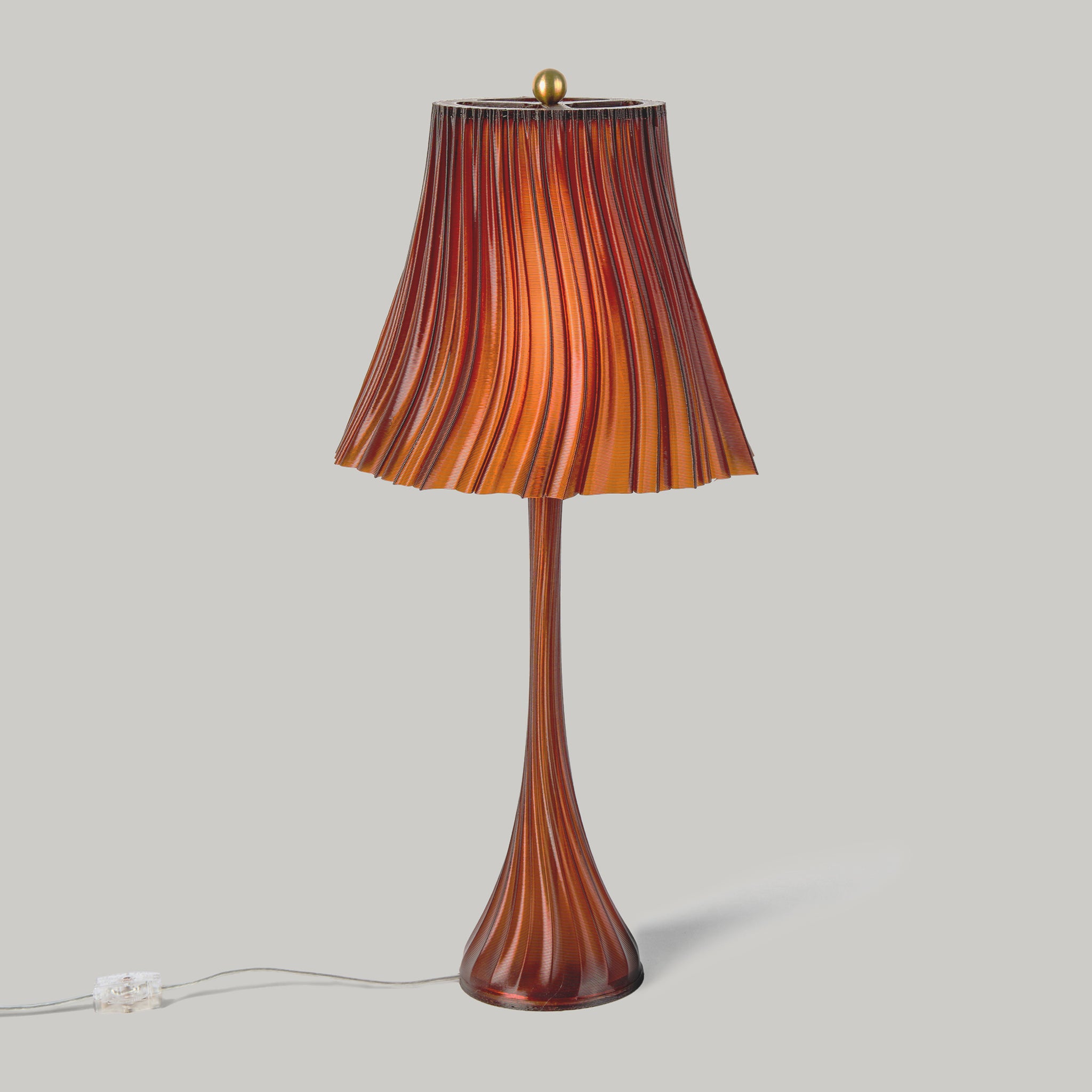 Pleat Lamp in Amber on white background