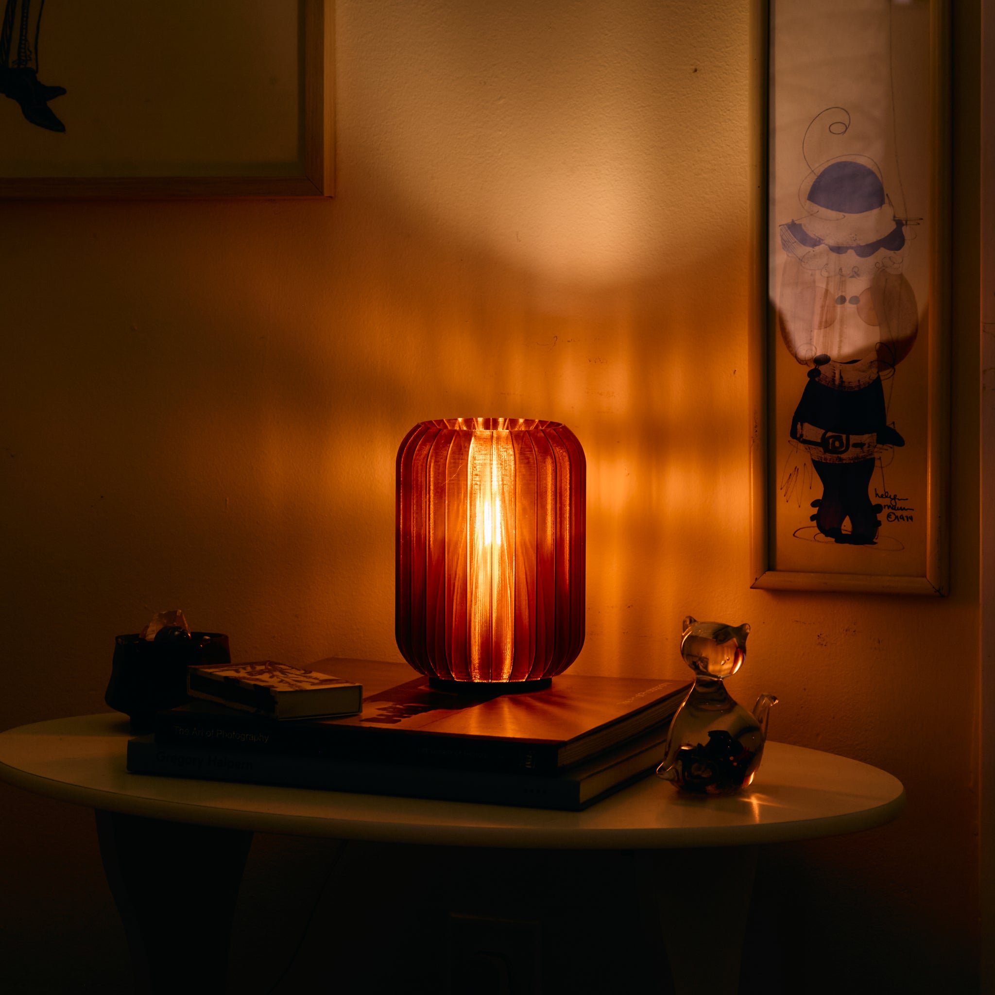 Image of a Wooj Mini Allium Amber lamp in a cozy living room