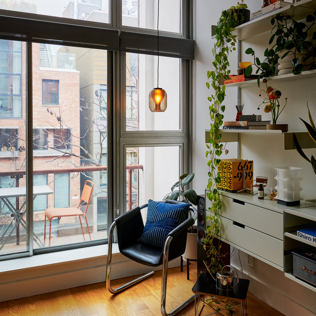 Image of Allium Pendant in front of a balcony and large window