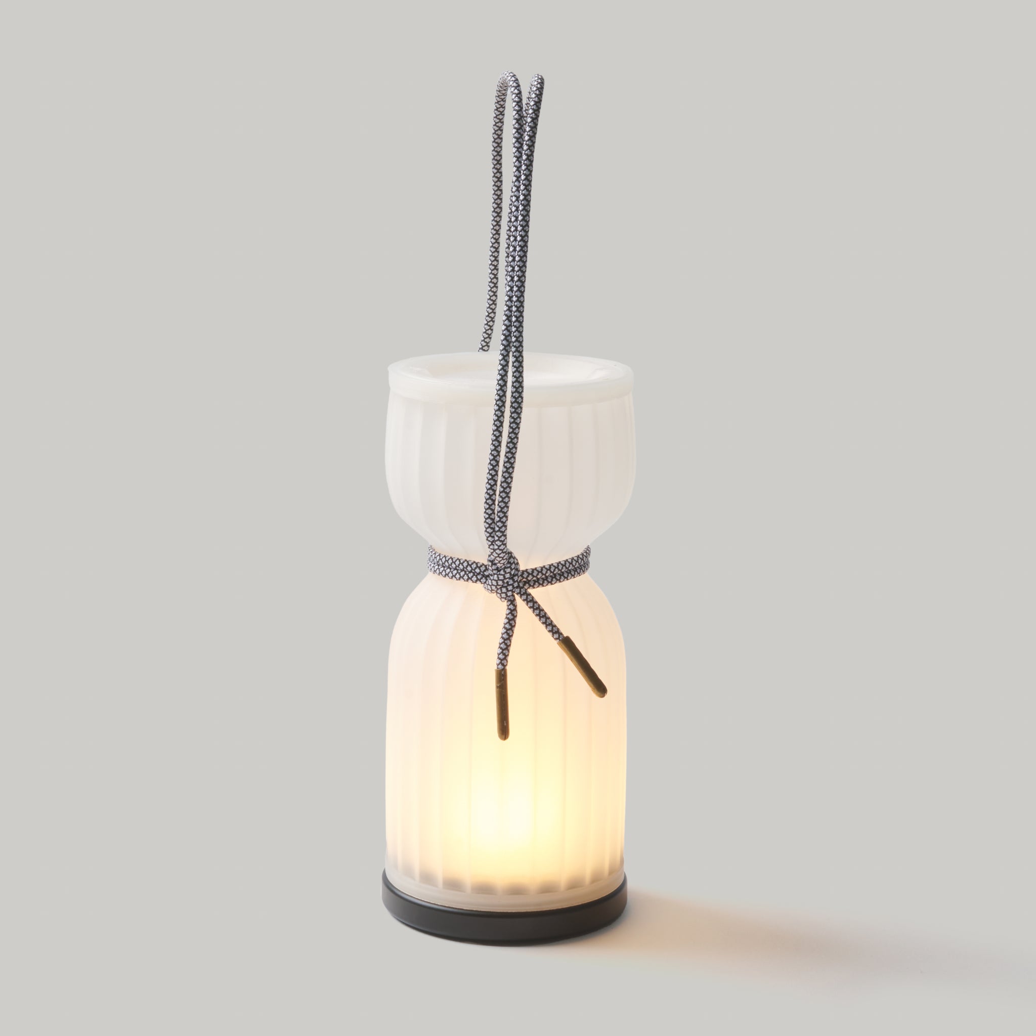 Cordless Camp Lantern with black and white cord on white background