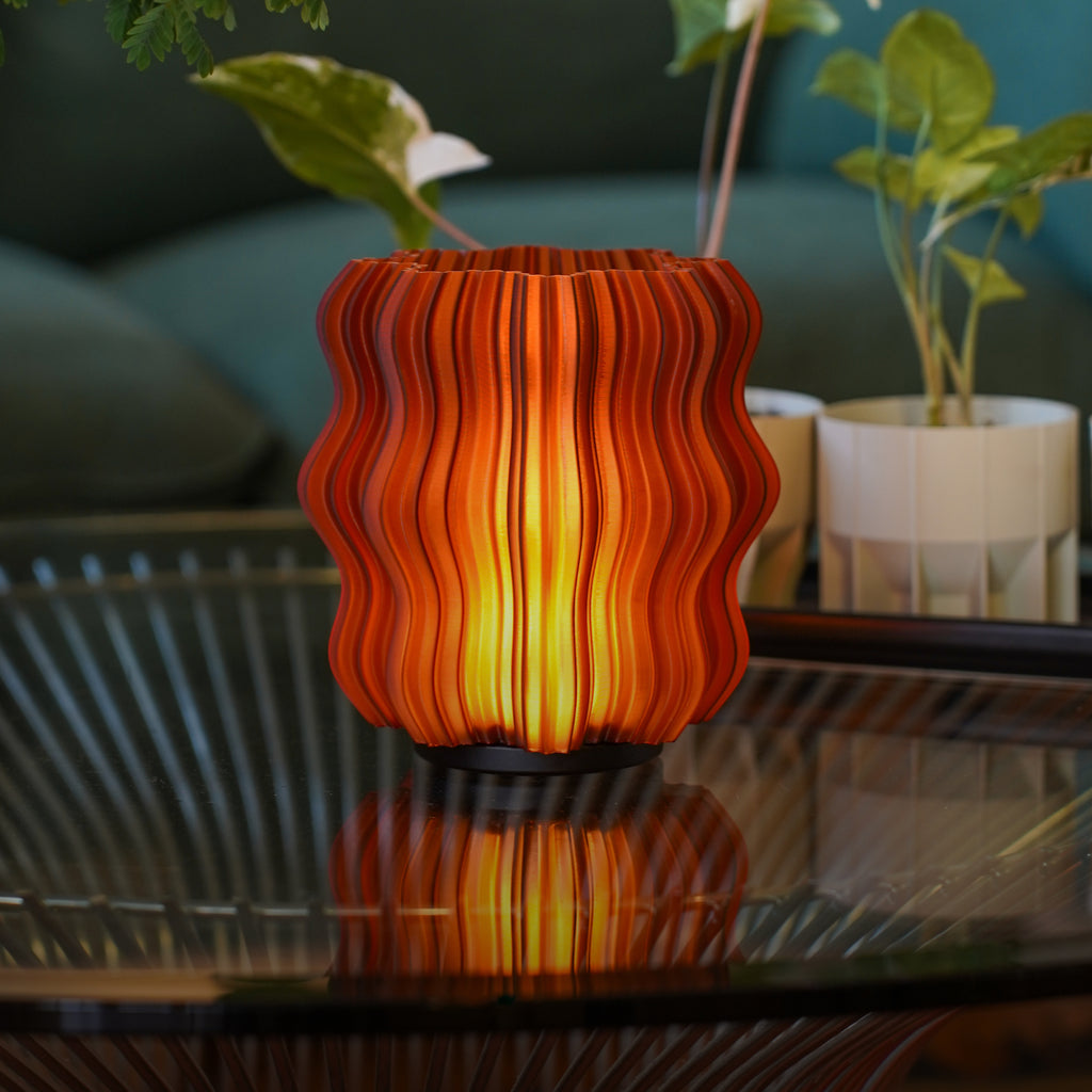 Cordless Mini Wavy Lamp in Amber on table