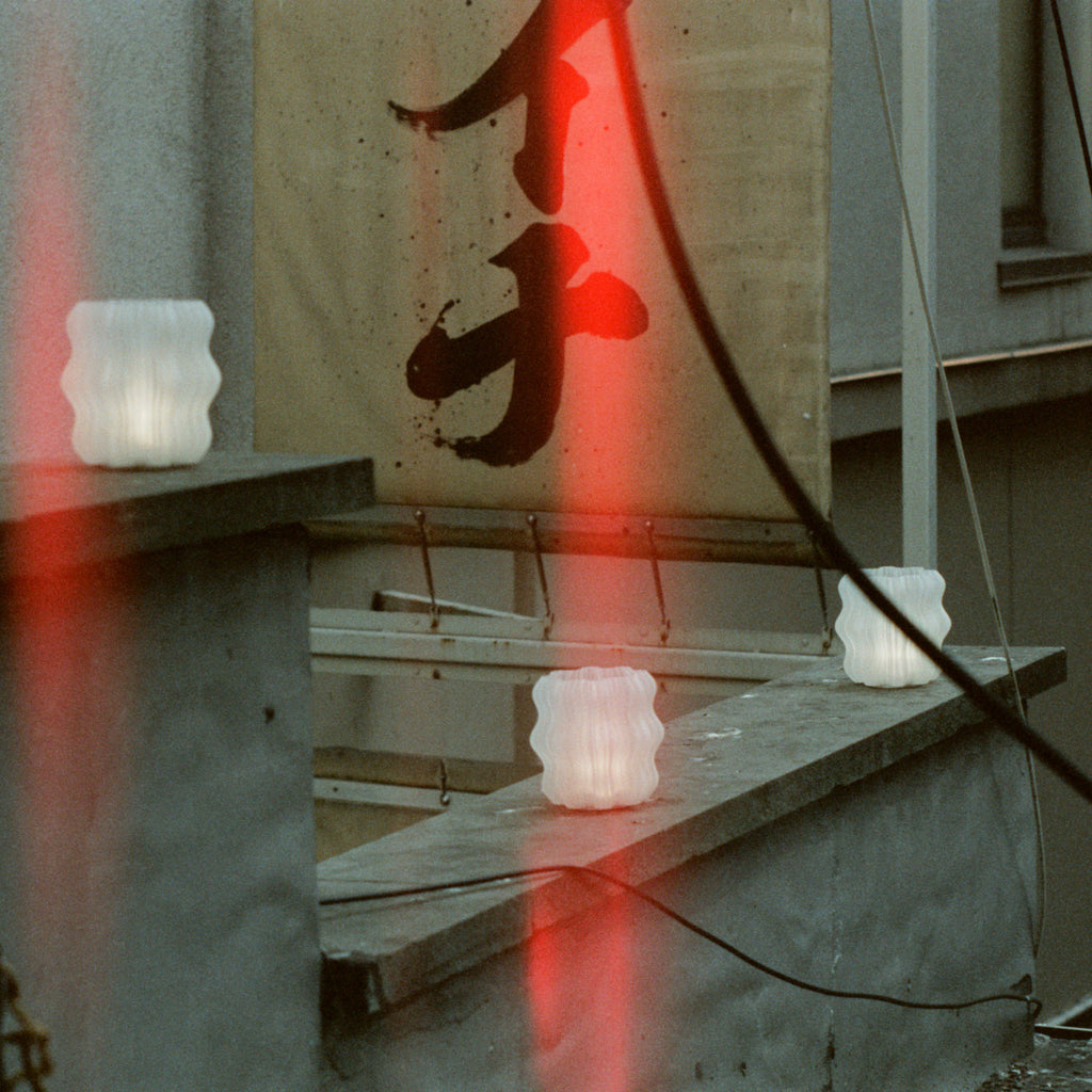 Cordless Mini Wavy Lamps on concrete wall