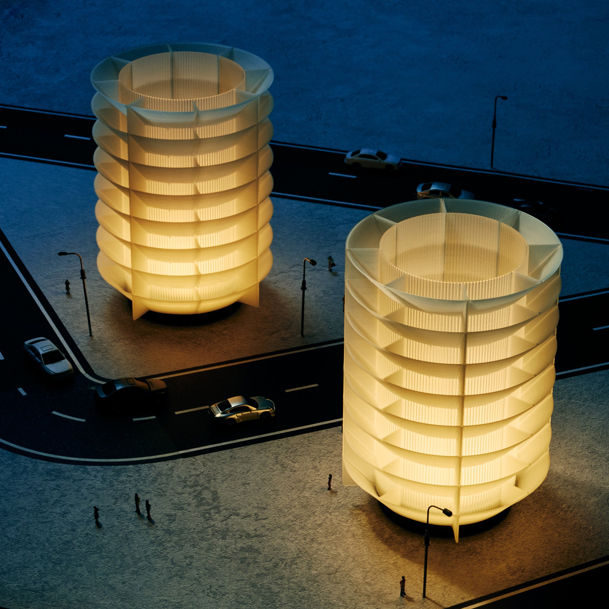 two cordless orbit lamps from above with a road and cars