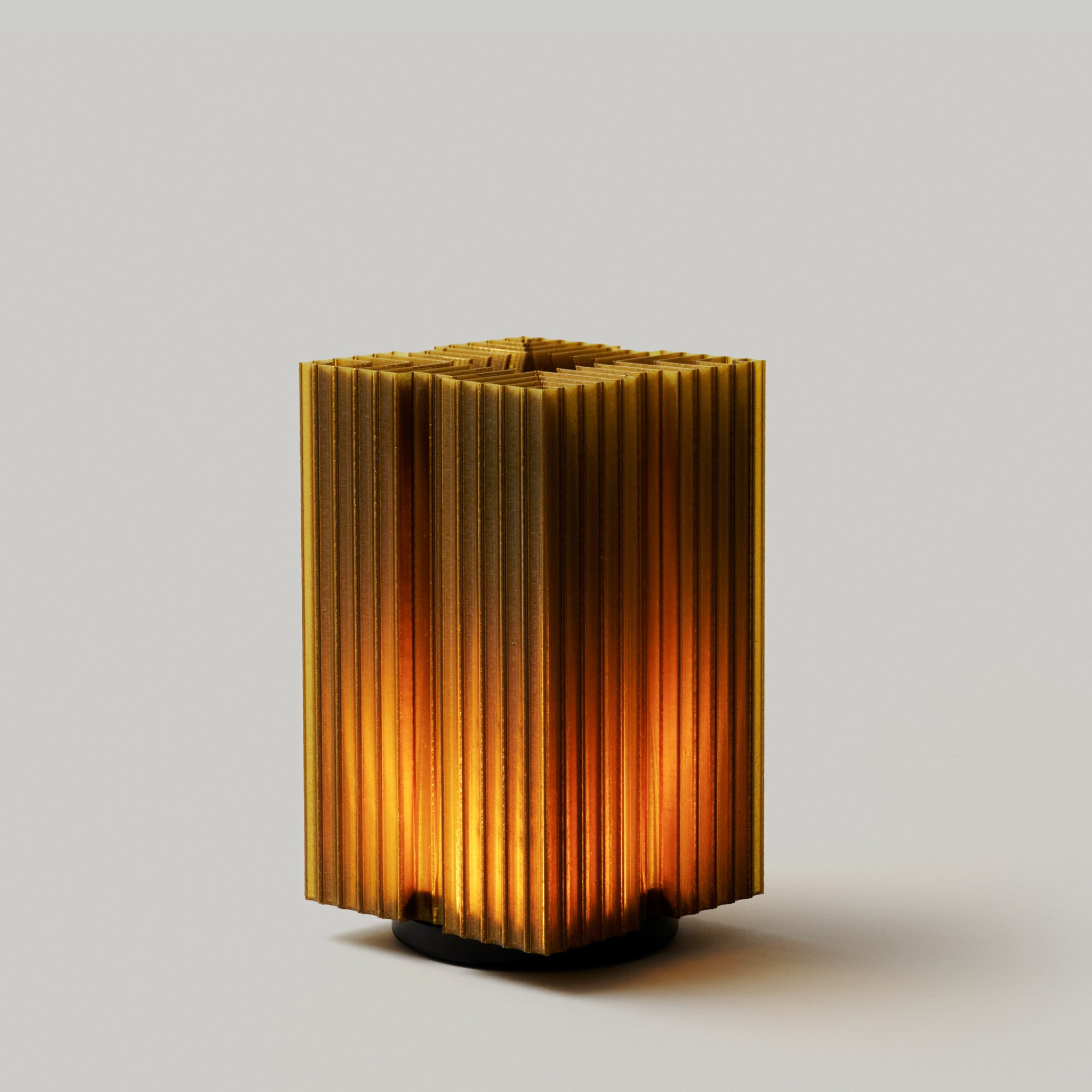 Cordless Mini Brut Lamp in Olive Oil on white background