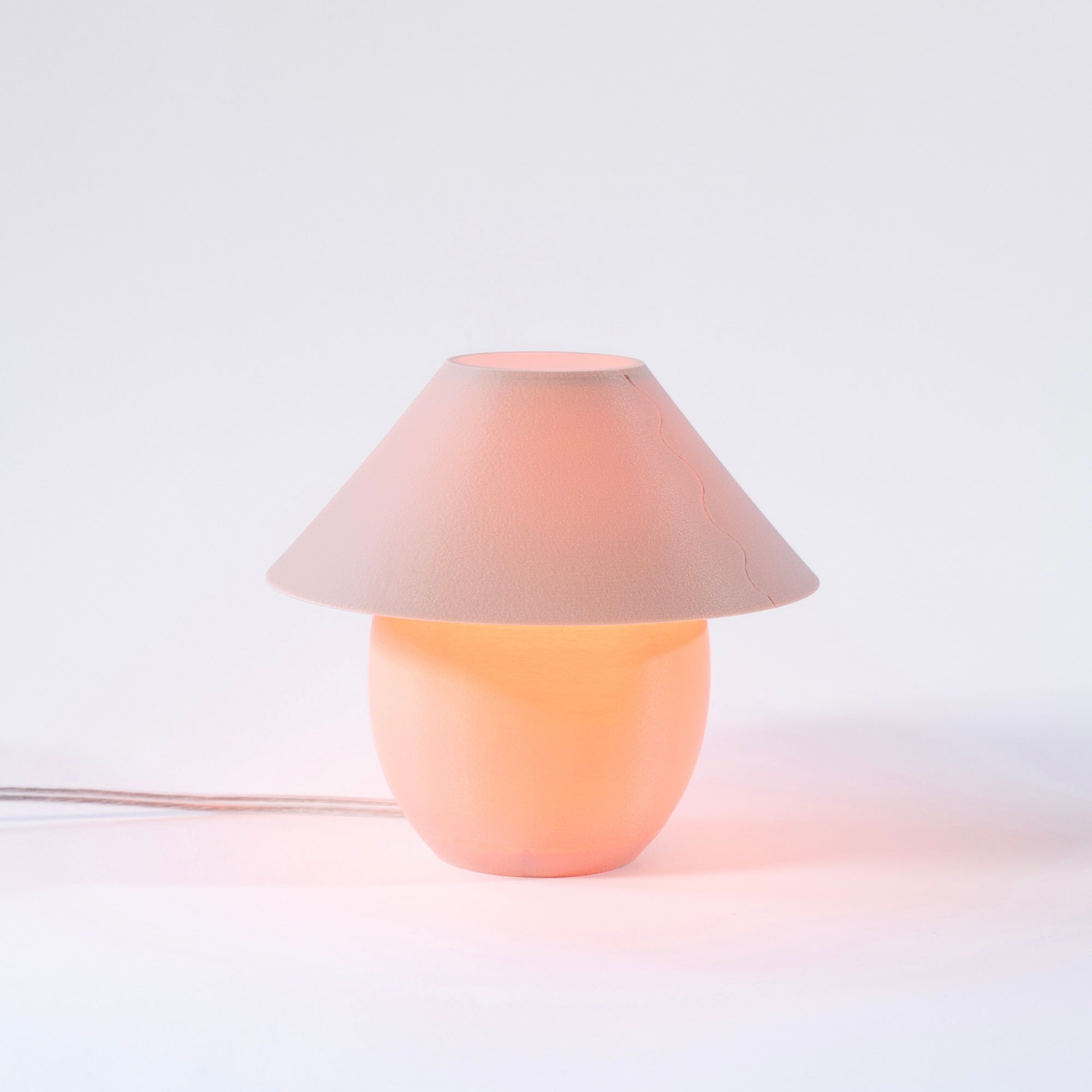 Scoop Lamp in blush on white background