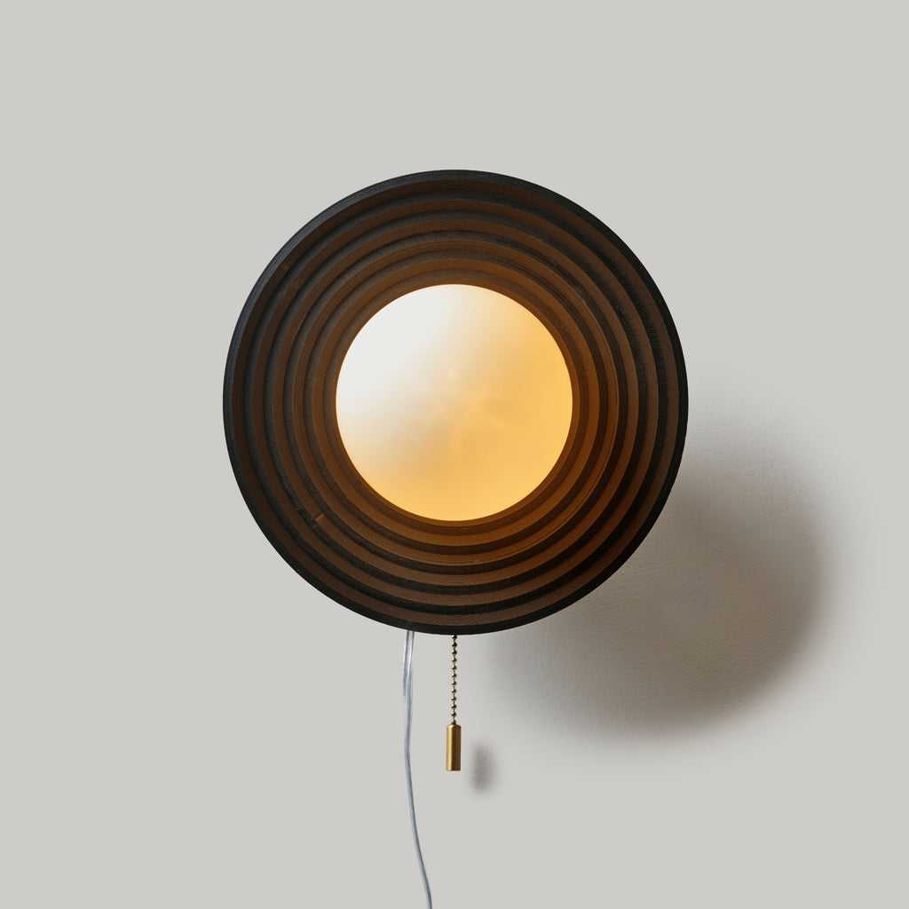 Echo Sconce in Matte Black on white background