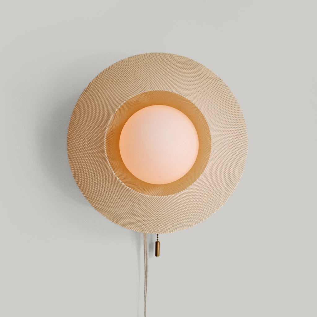 Helios Sconce in Eggshell on white background