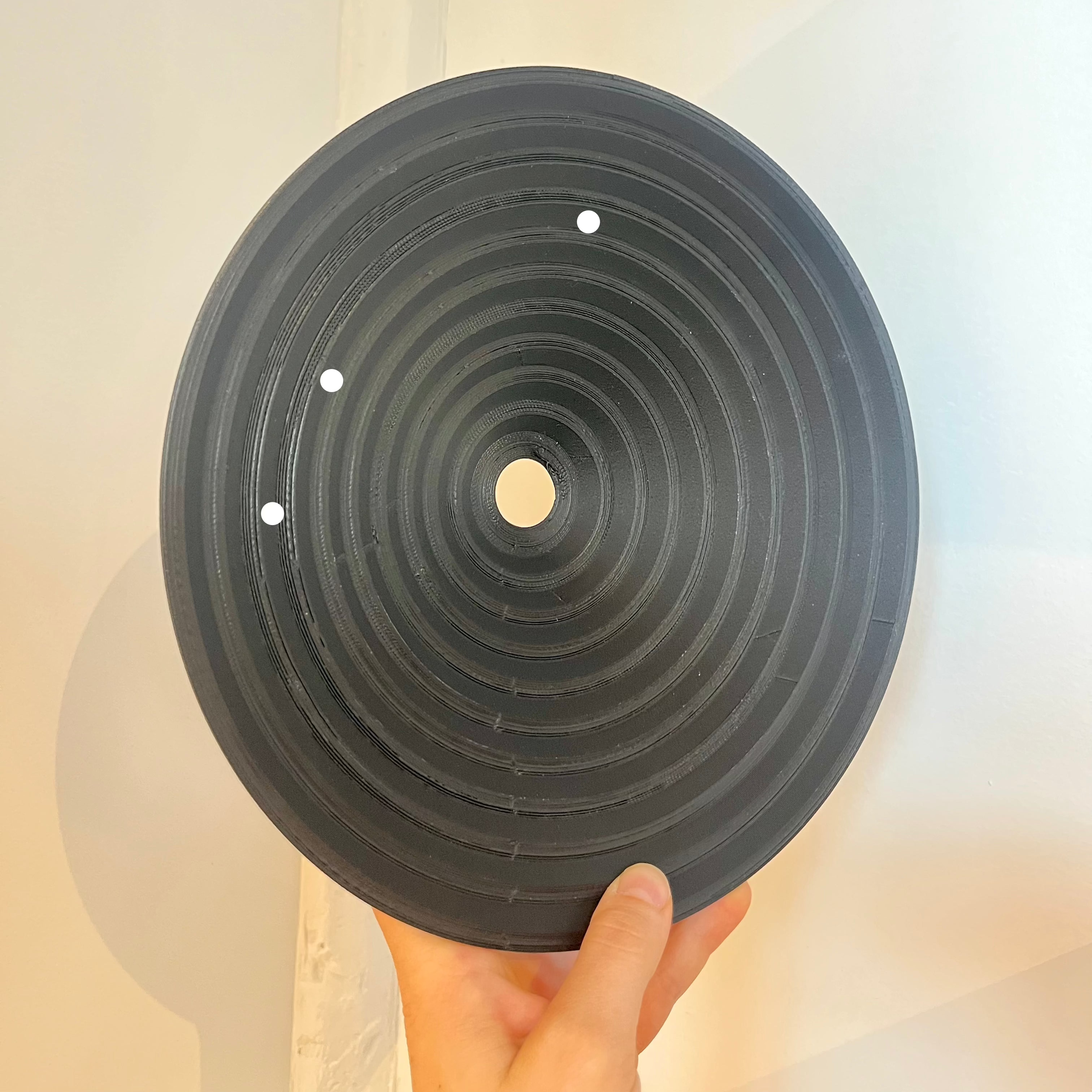 Echo Sconce shade in Matte Black with defect on white background