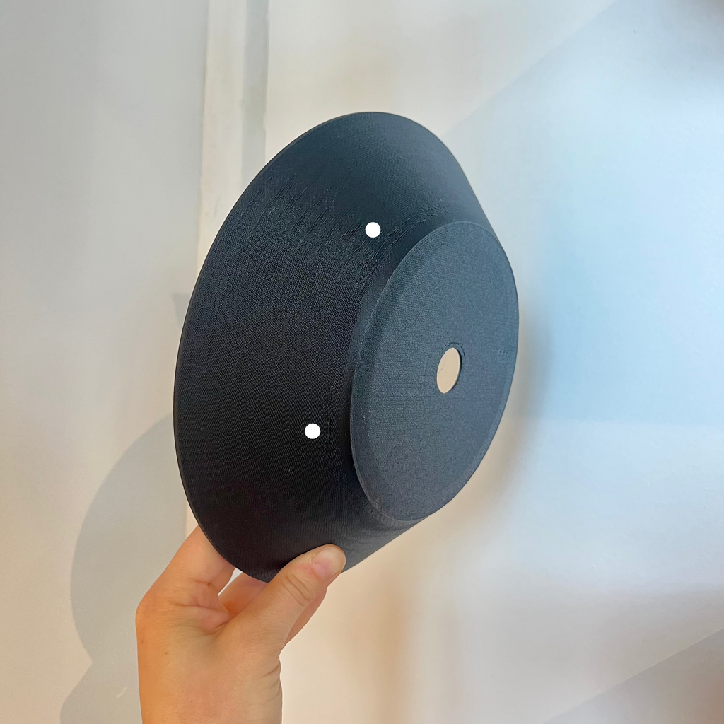 Echo Sconce shade in Matte Black with defect on white background