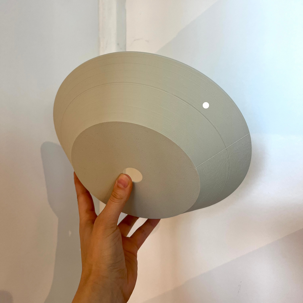 Echo Sconce shade in Eggshell with defect on white background