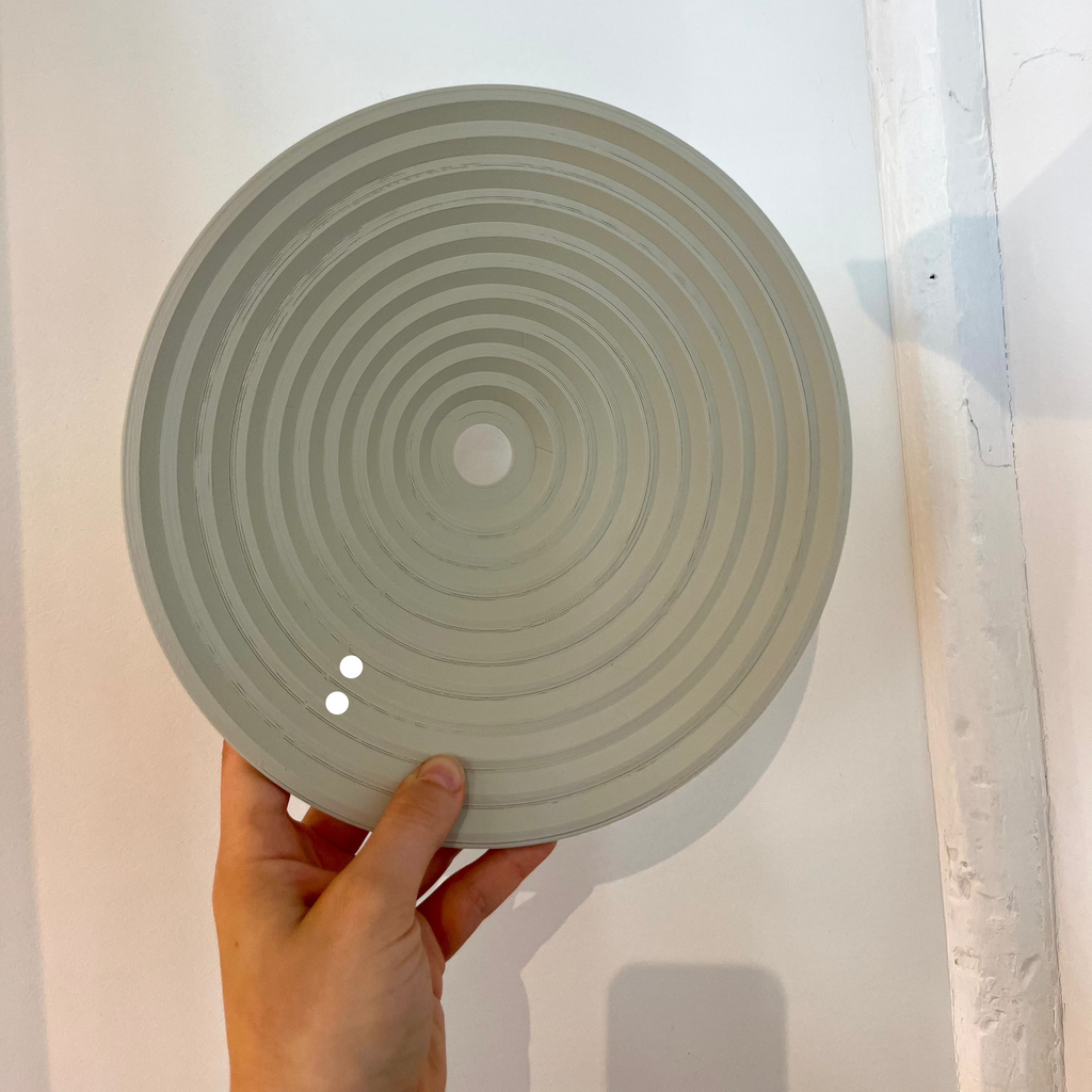 Echo Sconce shade in Eggshell with defect on white background