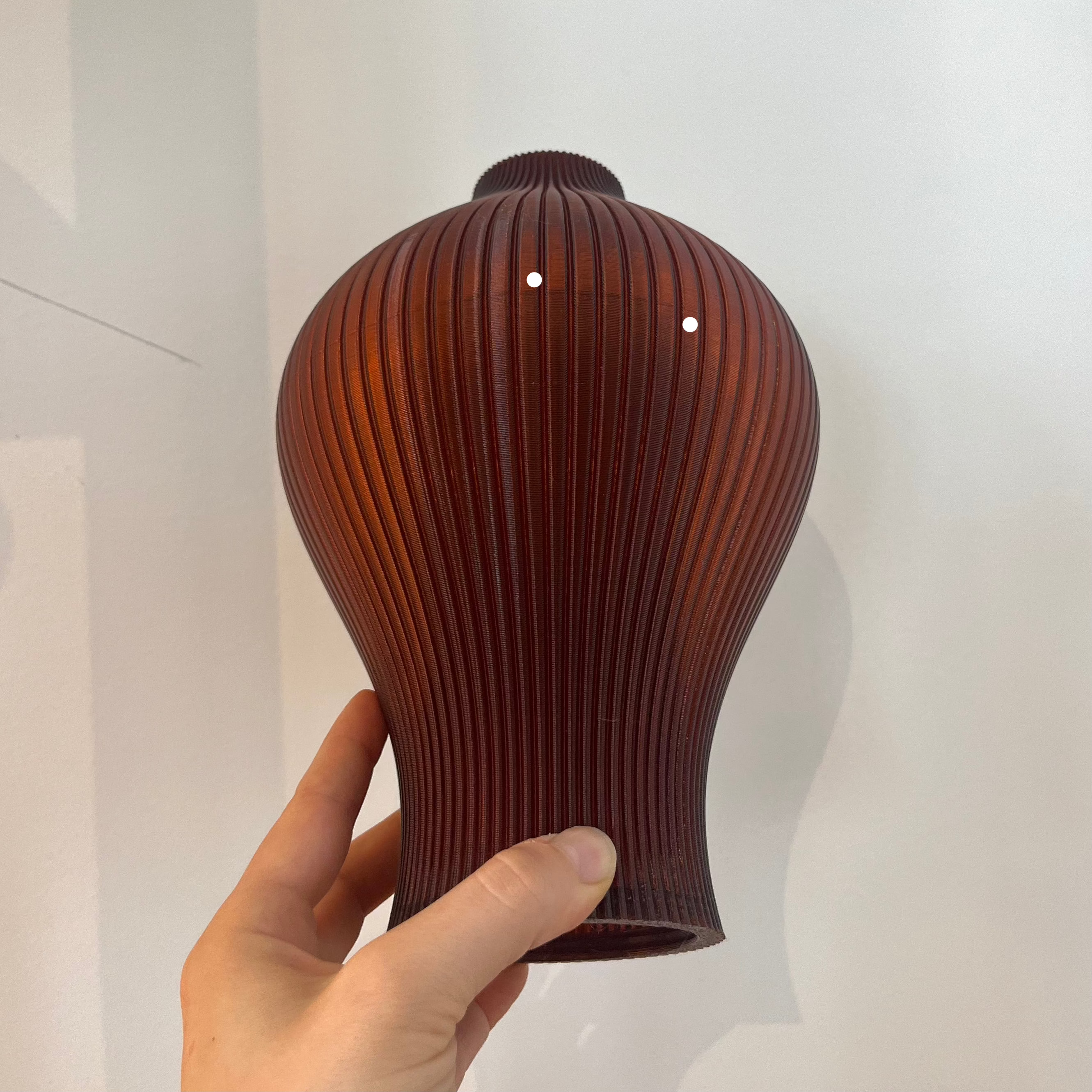 Baleine Lamp in Amber with defect on white background