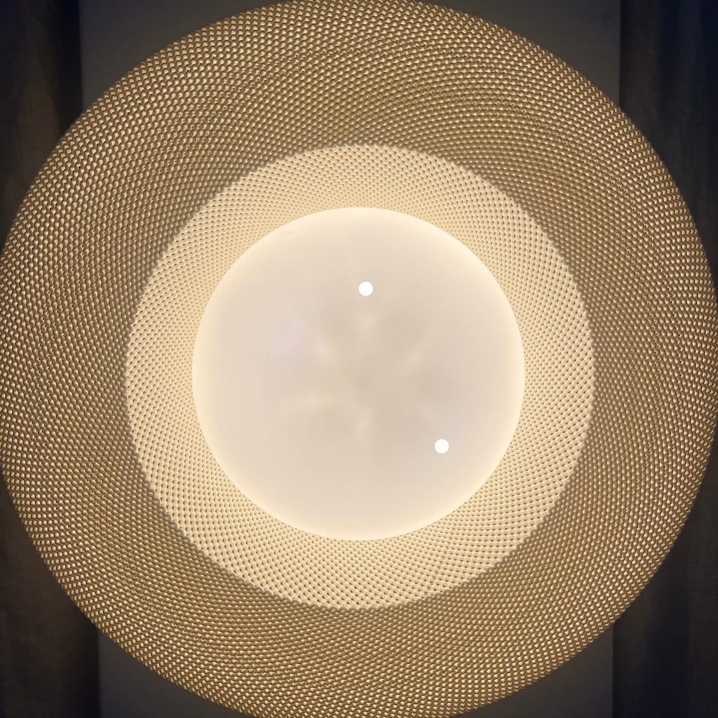 Helios Sconce in Eggshell with globe defect.