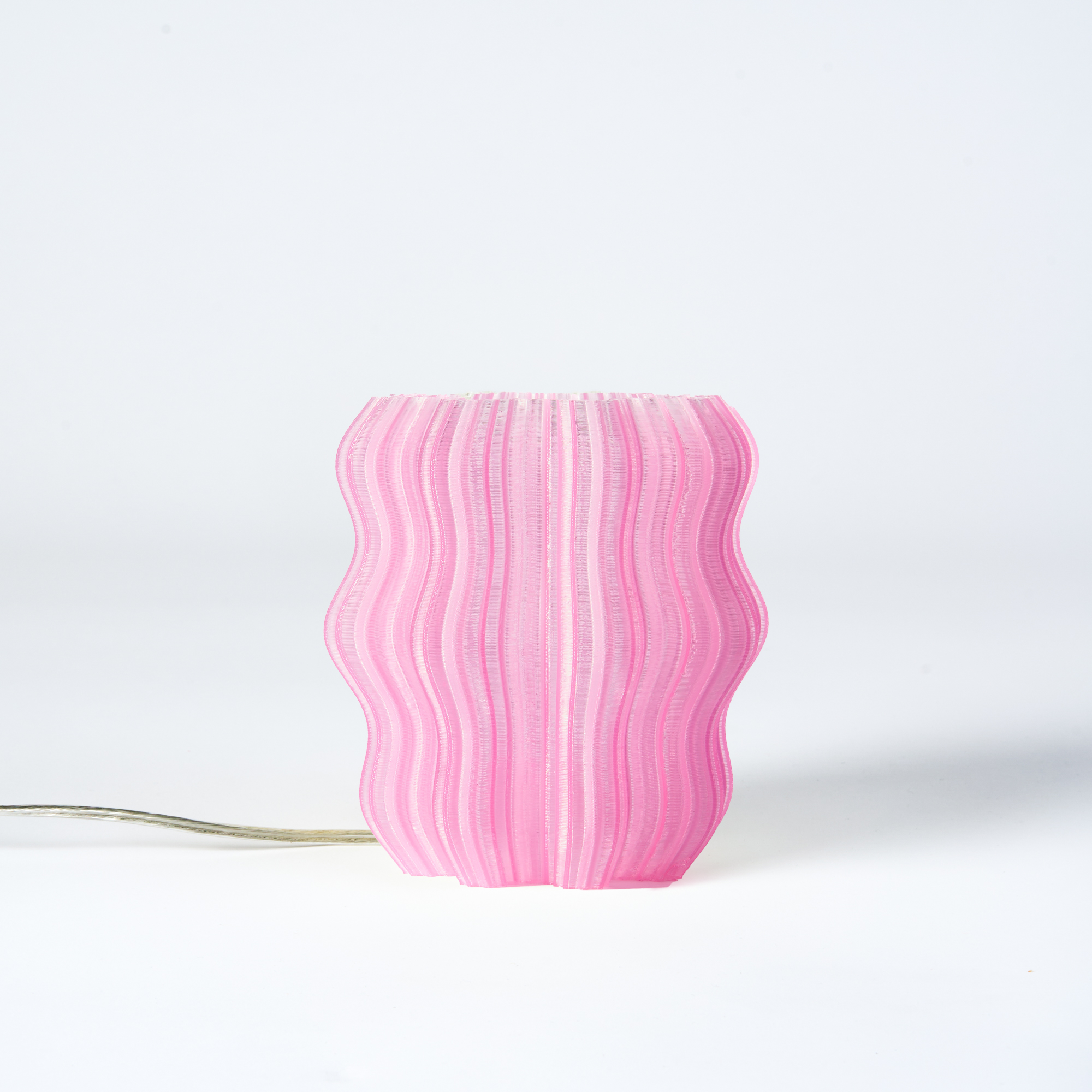 Pink Mini Wavy Lamp on white background