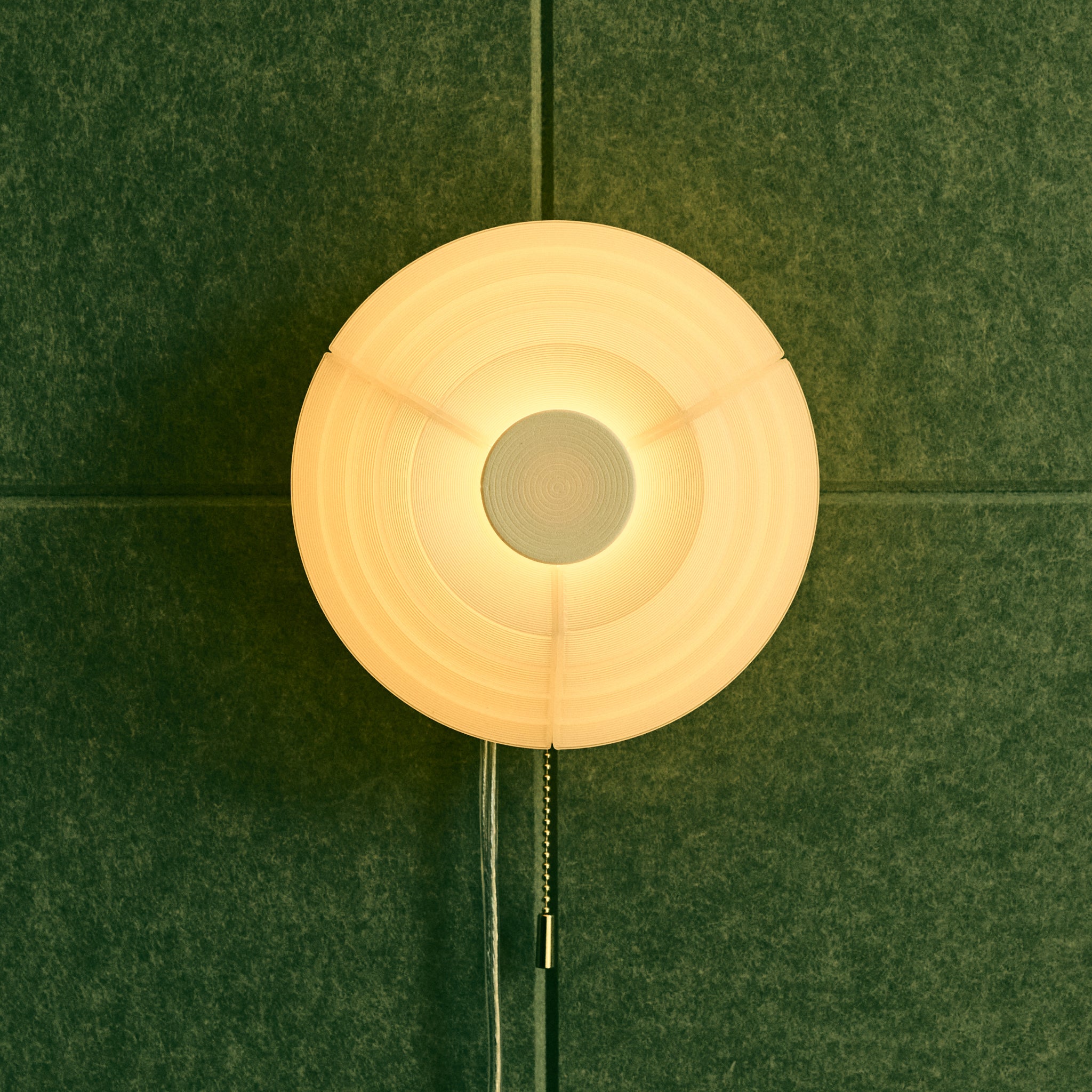 Offset Sconce on green background