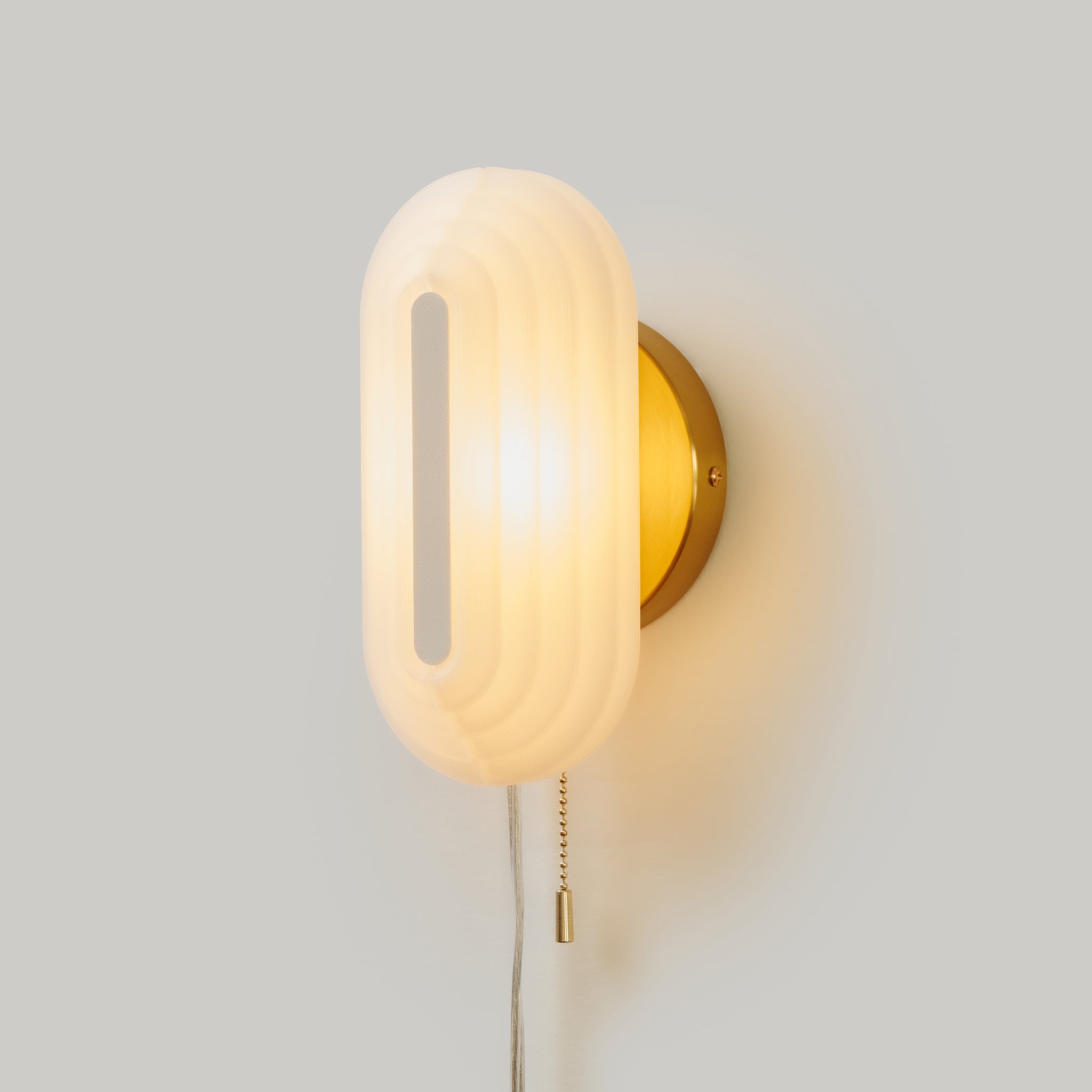Pill Sconce side view on white background