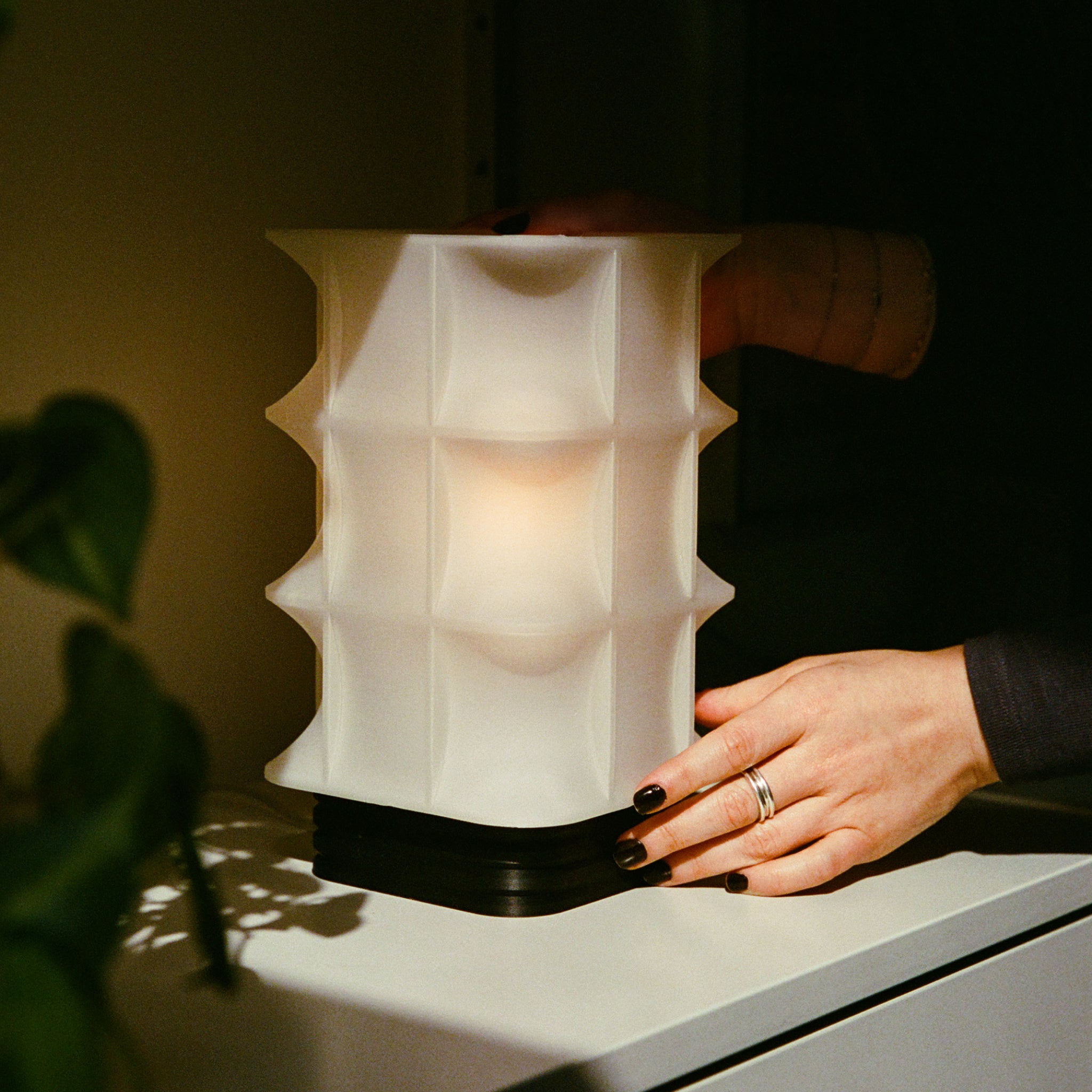 Image of Scaffold Lamp with human interaction