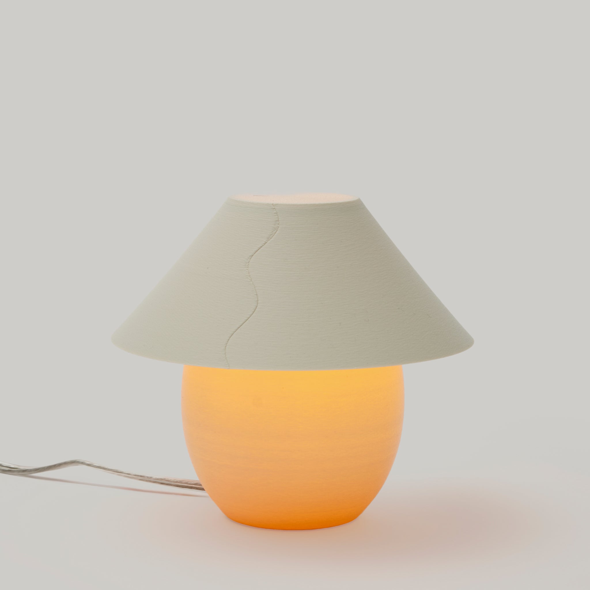 Scoop Lamp in Eggshell on white background