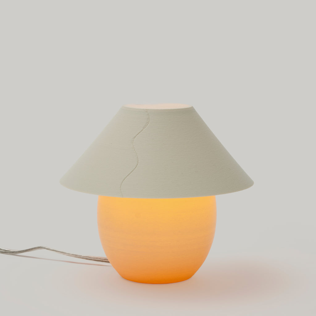 Scoop Lamp in Eggshell on white background
