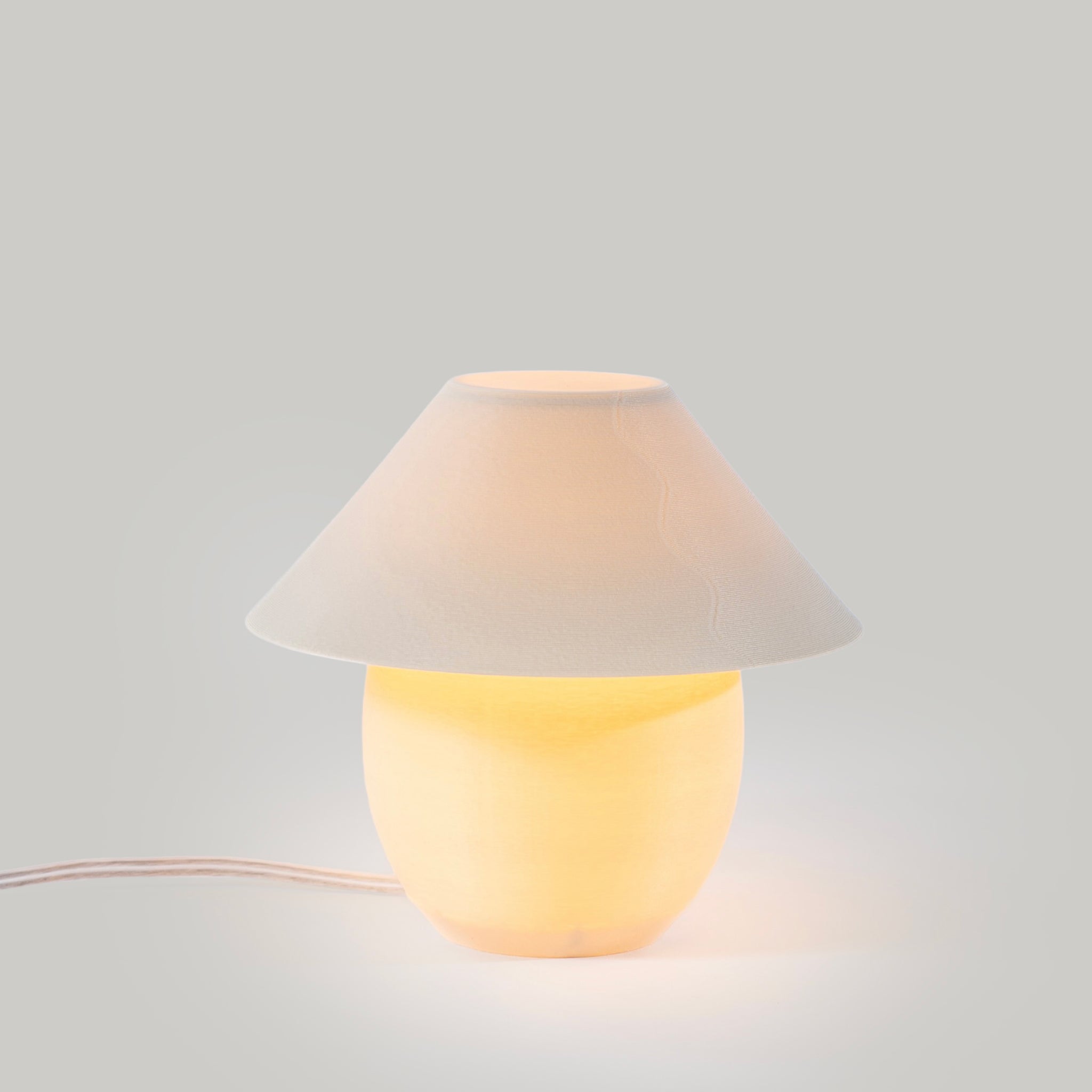 Scoop Lamp in eggshell on white background