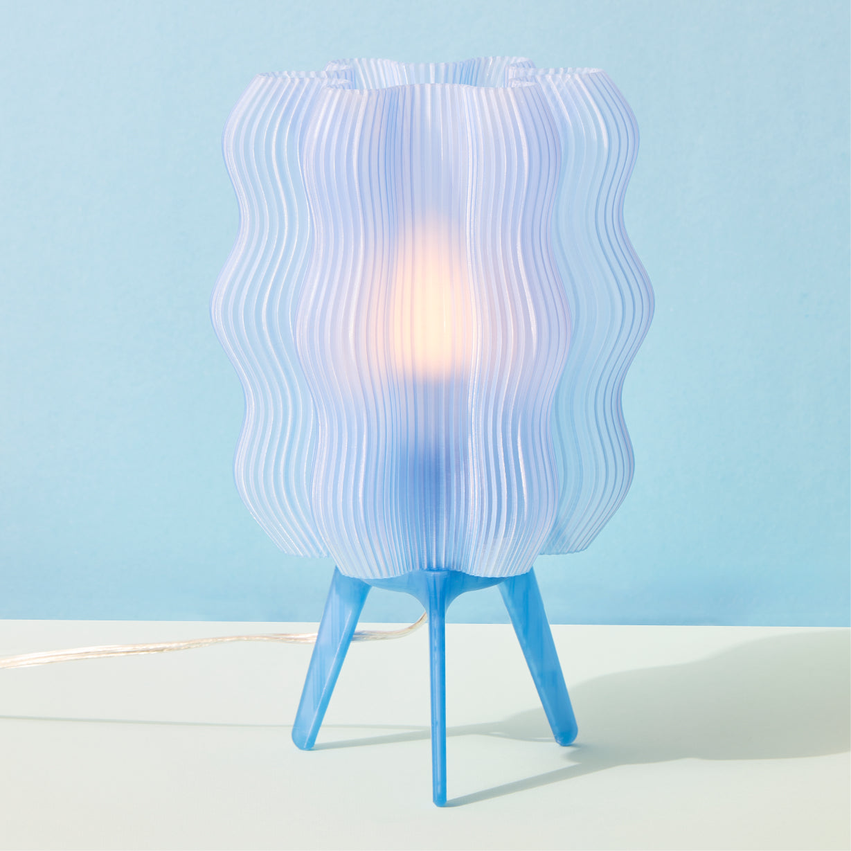 Wavy Lamp in periwinkle on blue background