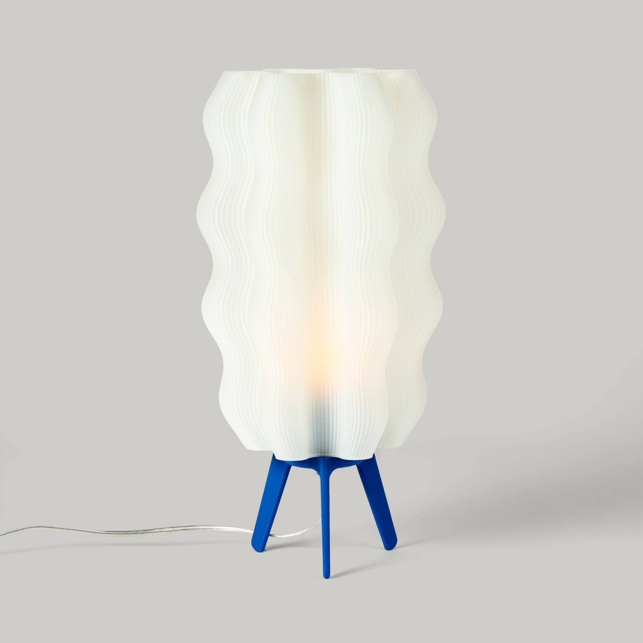 Tall Wavy Lamp in cobalt on white background