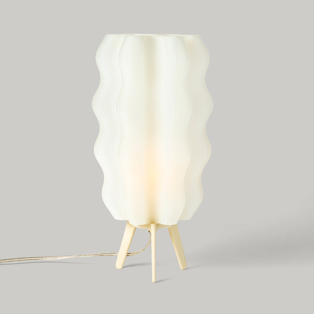 Tall Wavy Lamp in eggshell on white background