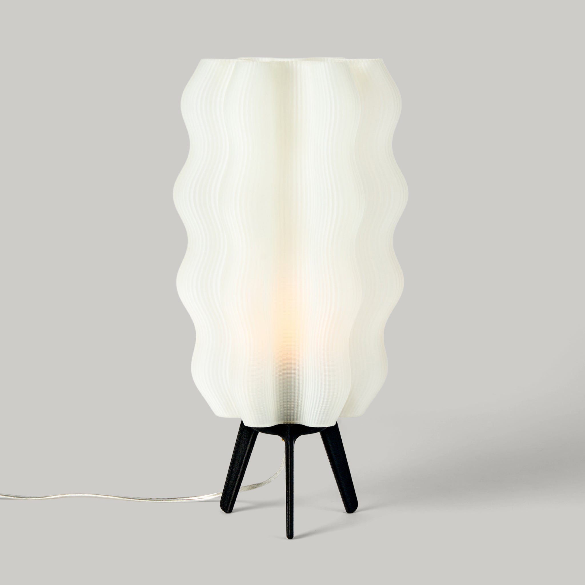 Tall Wavy Lamp in matte black on white background