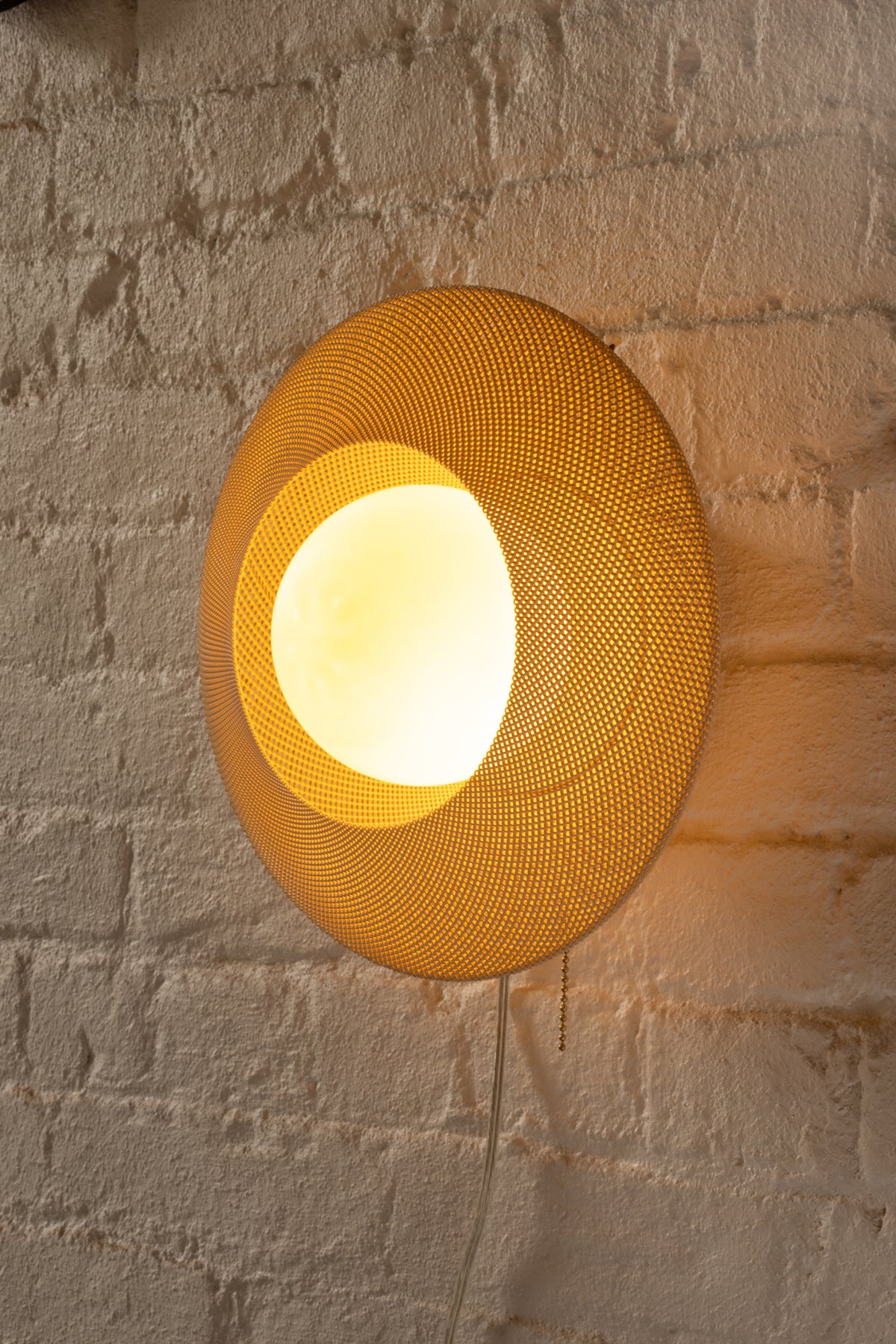 Helios Sconce, lit
