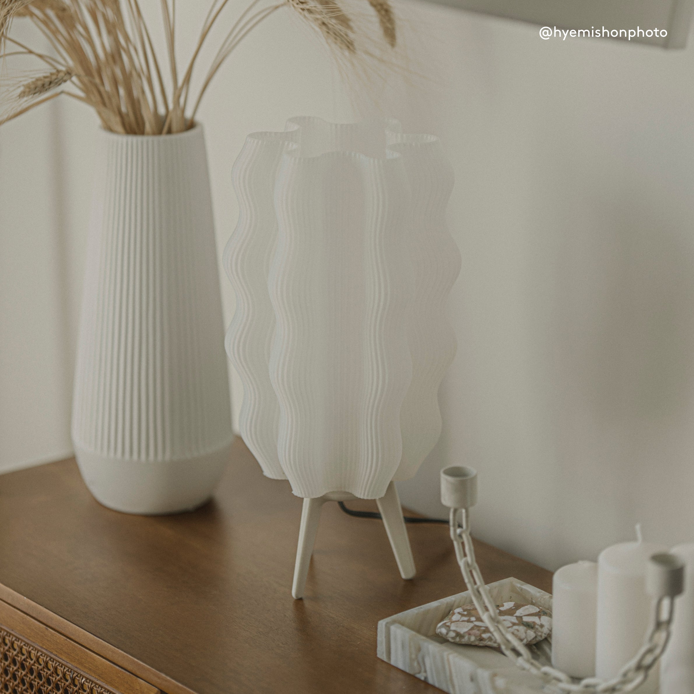 Tall Wavy Lamp in eggshell on side table